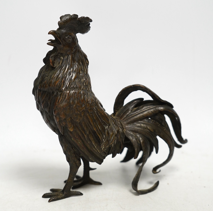 A bronze study of a cockerel, 17cm. Condition - good